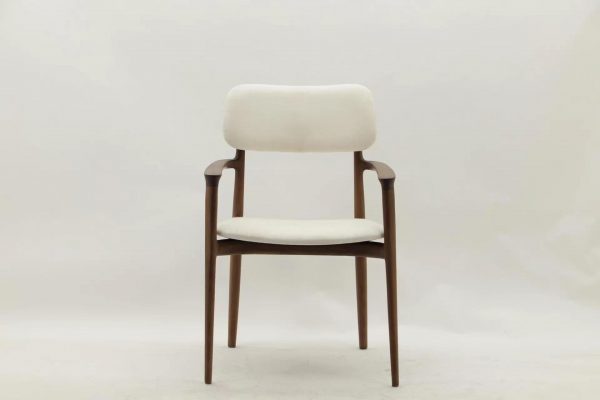 new design armchair with great sensuality carved in wood